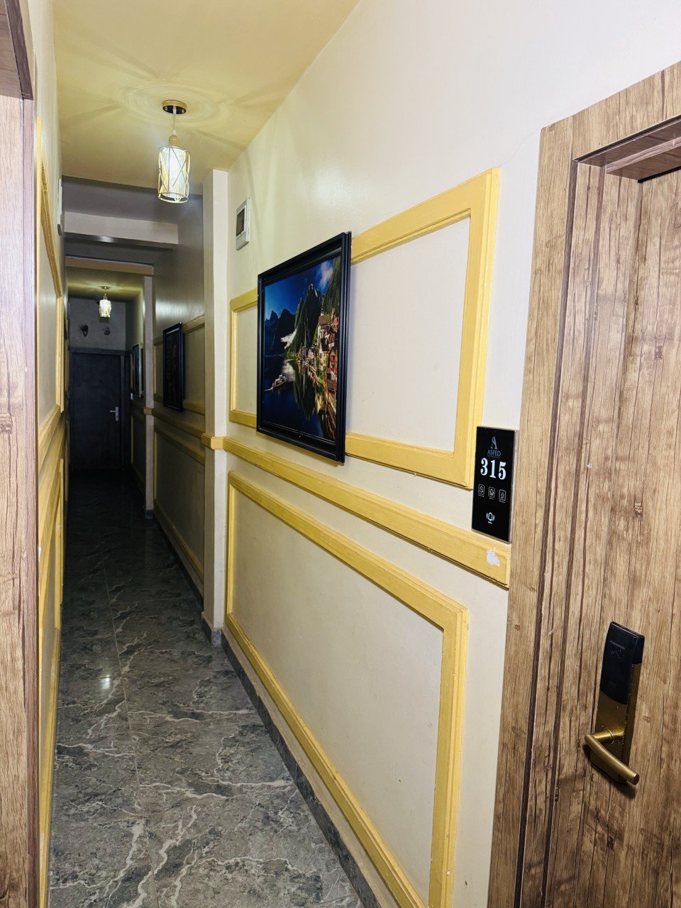 Hallways at Asfed Lounge & Suites — photograph 2